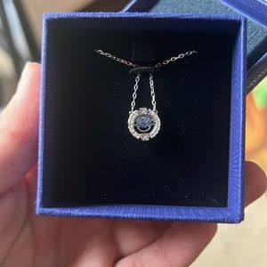 Swarovski "dancing" necklace.